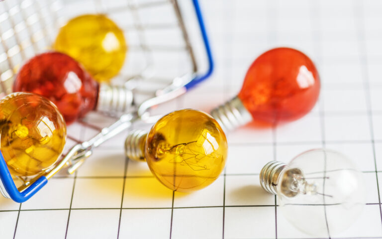 Colorful light bulbs in a basket