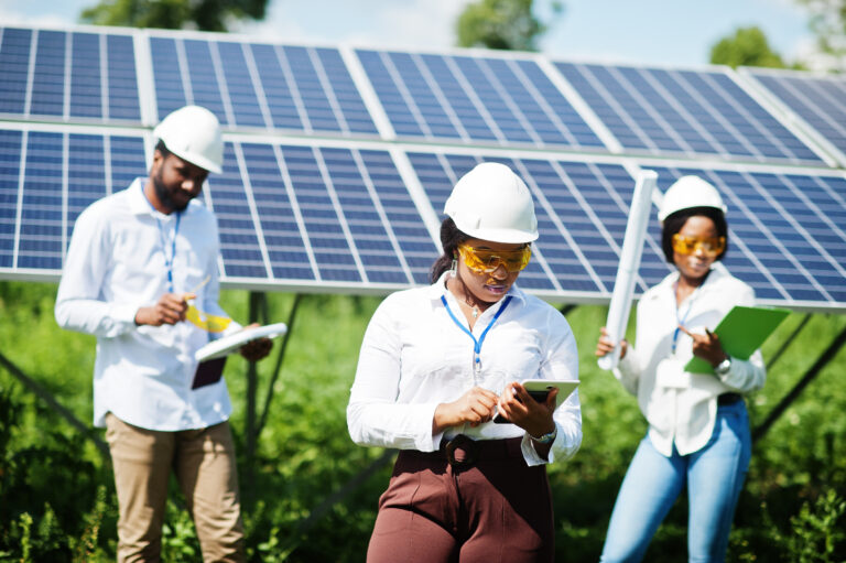 African american technician checks the maintenance of the solar